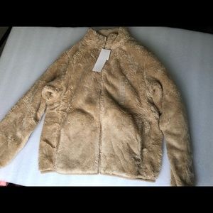 Zippered up fleece jacket by Uniqlo. NWT long sleeve fleece jacket.